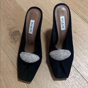 Alaia Black Mules with Silver Accent